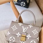 LV Madeleine 24cm bag - Beige
